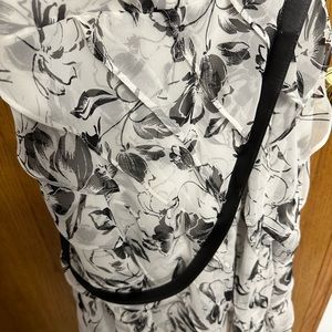 White a black ruffle sleeveless cocktail dress